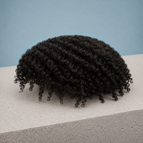 prothèse capillaire avec boucle afro
